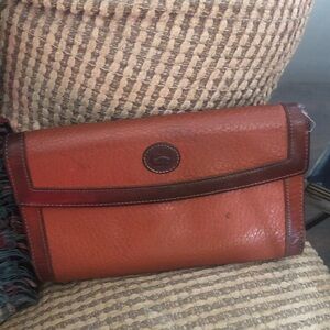 Vintage very worn Brown Cognac Authentic Dooney & Burke pebbled leather wallet.